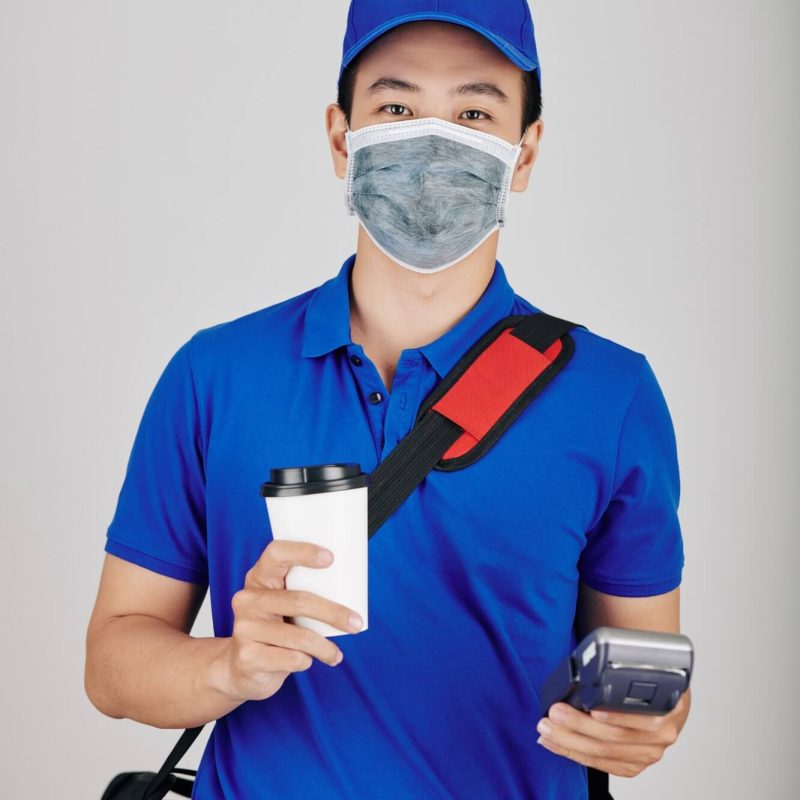 cheerful-courier-with-cup-of-coffee-1.jpg